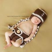 Crochet football hat and diaper cover set in newborn size